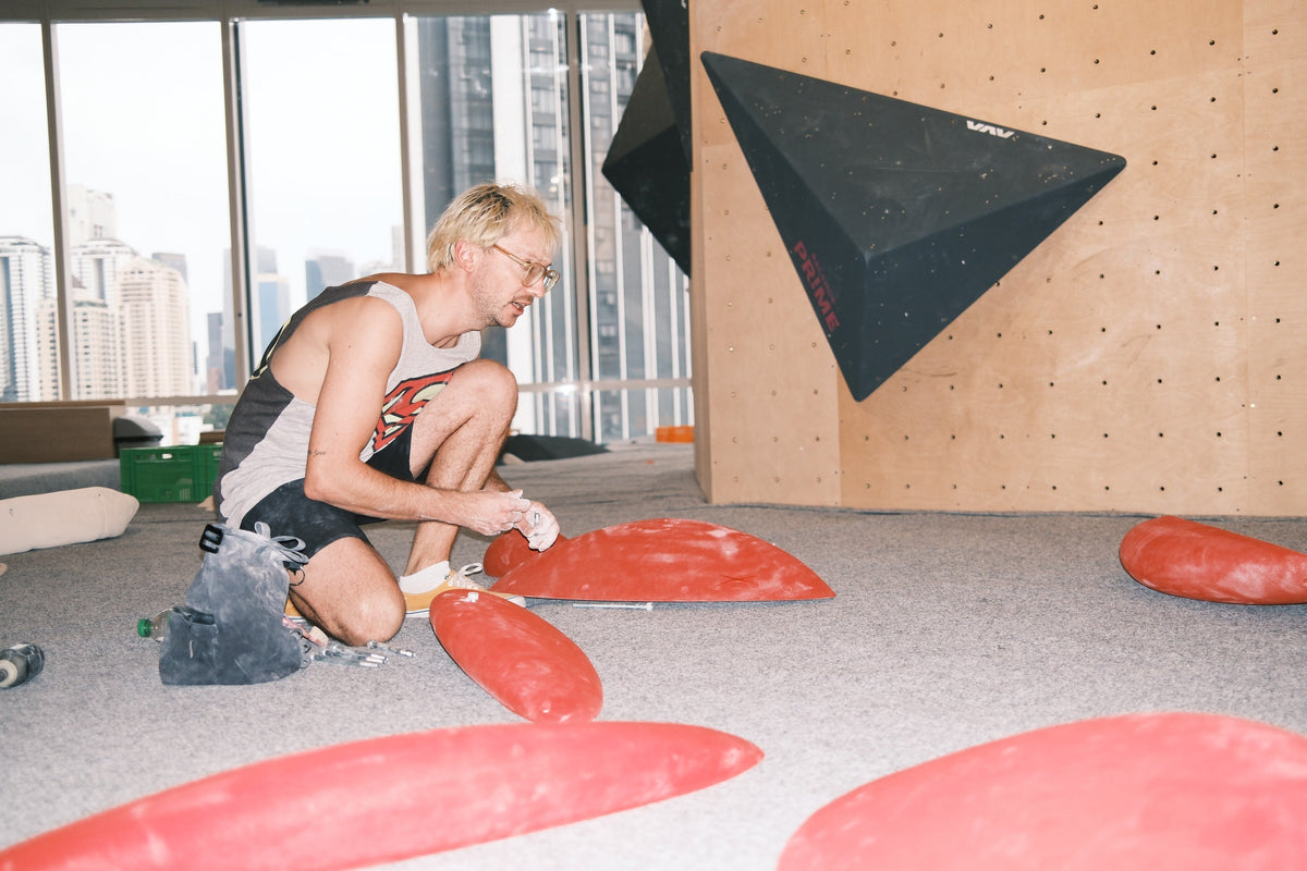 Niklas Wiechmann, alias @schniklas, setting at Balance Climbing with some Captain Crux macros.